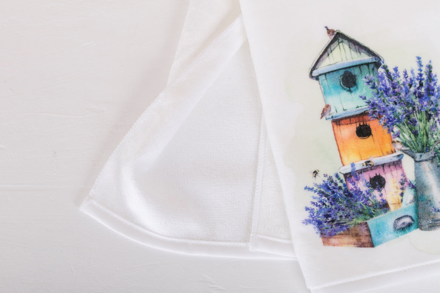 Lavender print towel folded on counter