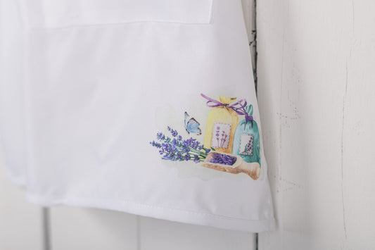 corner of apron showing lavender design