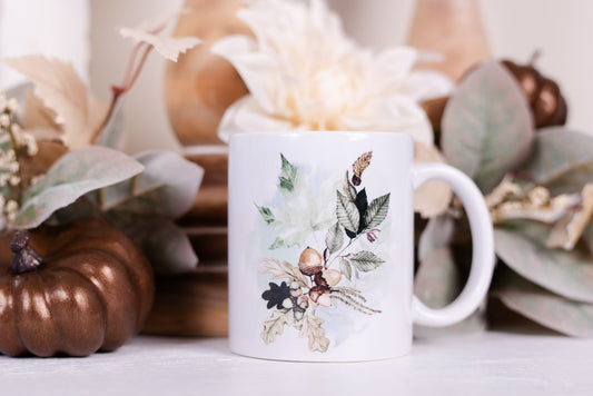 Woodland botanical mugs with acorn and oak leaf art styled with fall florals