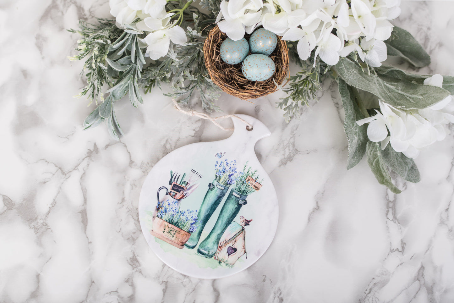 Watercolor garden scene on ceramic spoon holder with soft tones