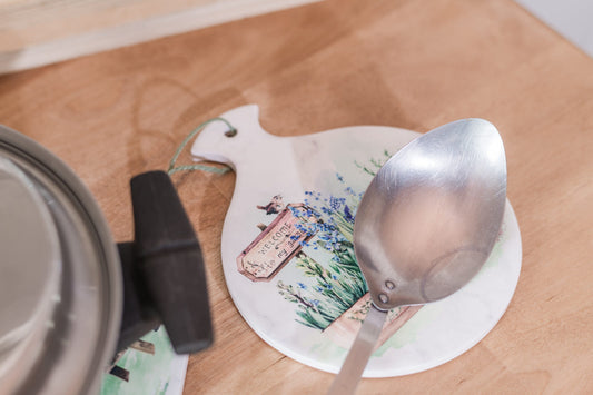 Country garden floral spoon rest with with spoon resting on it