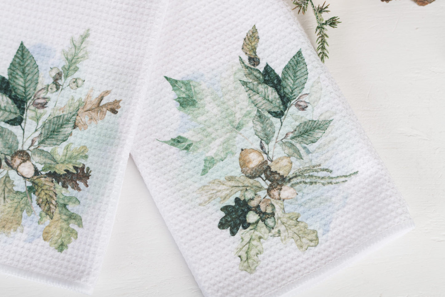 Neutral fall tea towels with watercolor leaves and acorns