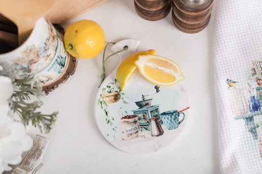 Country kitchen spoon rest styled with lemons and pepper grinders