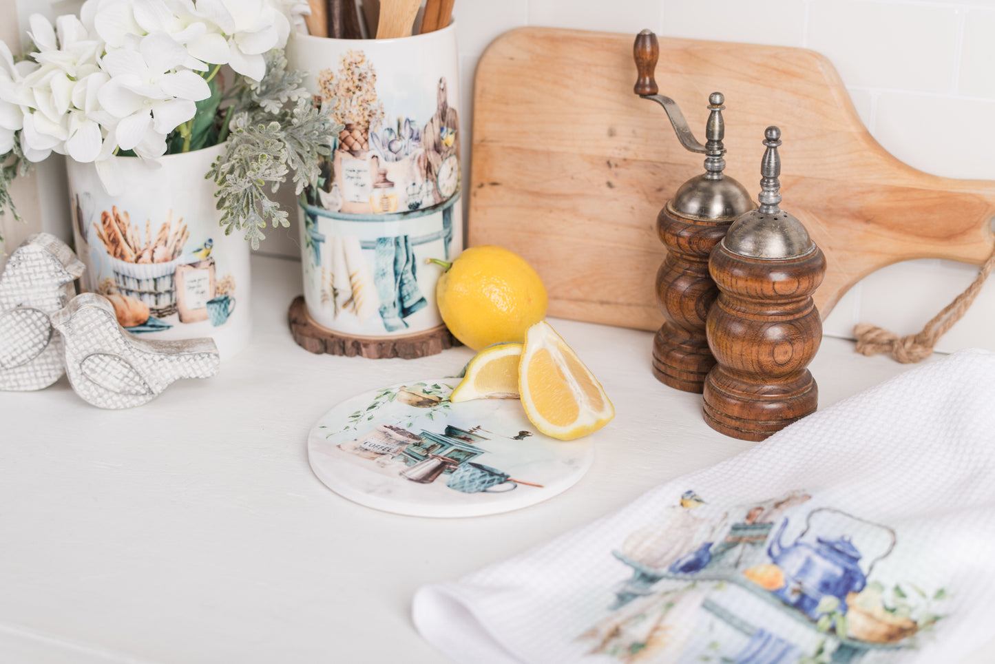 Country kitchen spoon rest with soft greenery and baking scene