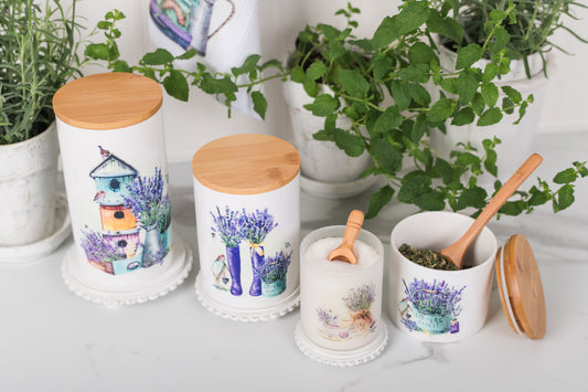 Set of ceramic canisters with watercolour lavender design holding bath salt