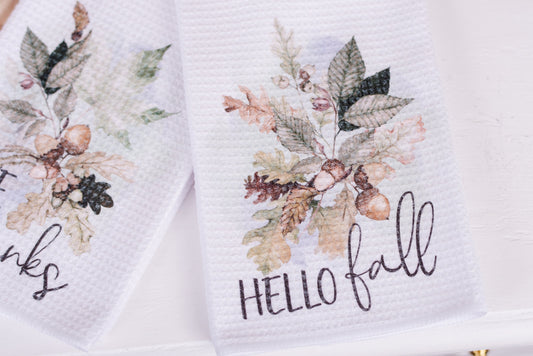Woodland tea towel set with 'Hello Fall' messages on white background