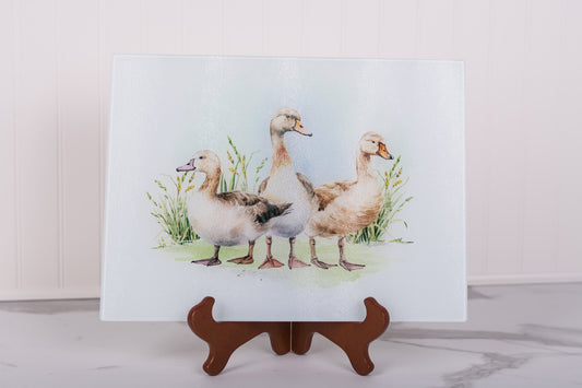 Farmhouse glass cutting board with three duck design
