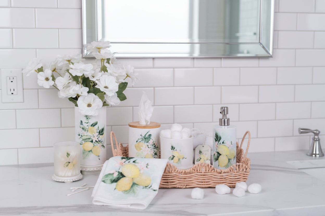 Lemon canisters styled in a bathroom on a scallop tray