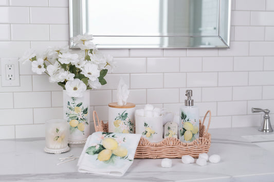 Lemon canisters styled in a bathroom on a scallop tray