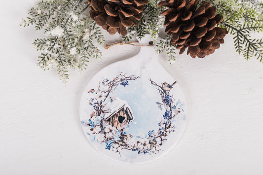 Holiday kitchen spoon rest with snowy heart birdhouse design