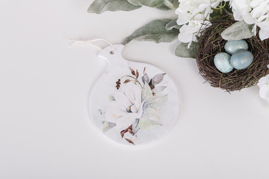 Ceramic spoon rest styled on white kitchen counter