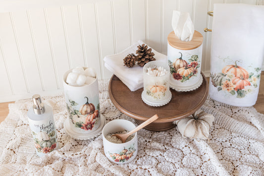Vintage Autumn warm pumpkin jars styled in a fall bathroom vanity