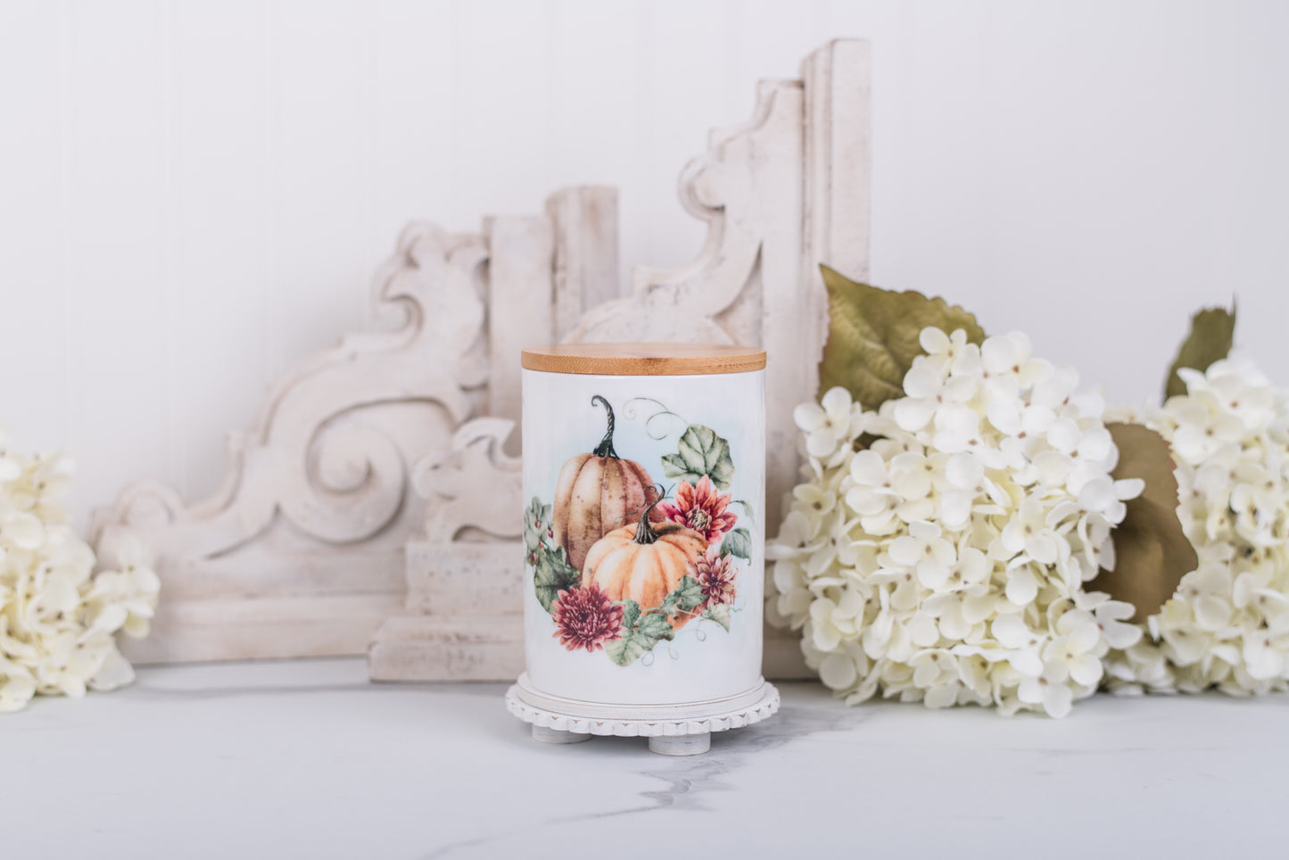 Medium ceramic jar with rich pumpkin floral artwork for bathroom