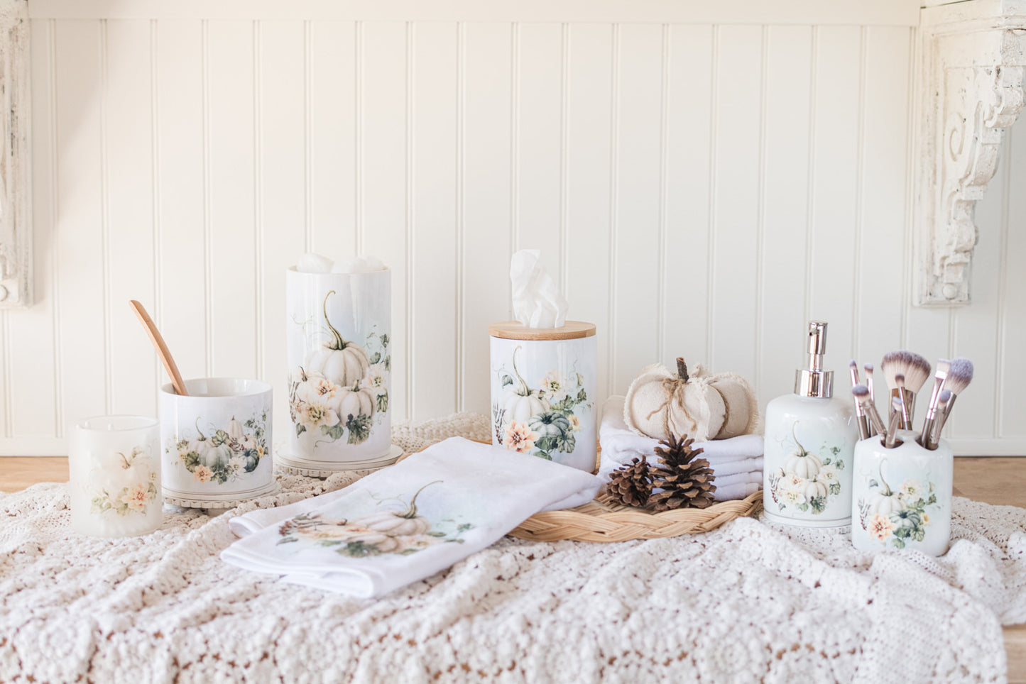 Vintage Autumn Collection soap pump and makeup brush holder, styled with towels and Bathroom jars with pinecones