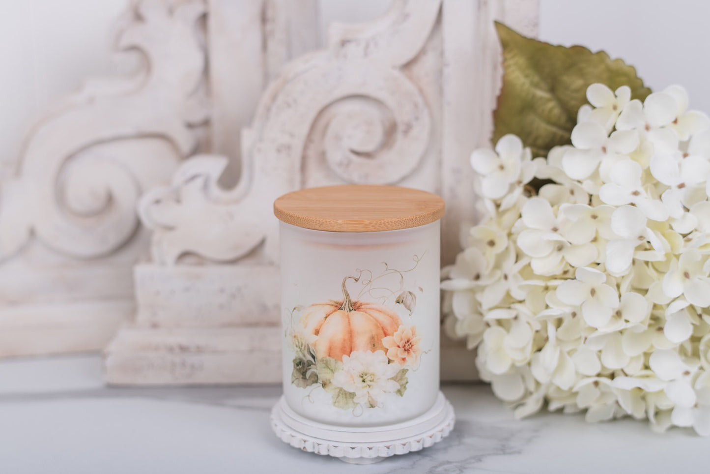 Extra small glass canister with pumpkin floral art and bamboo lid