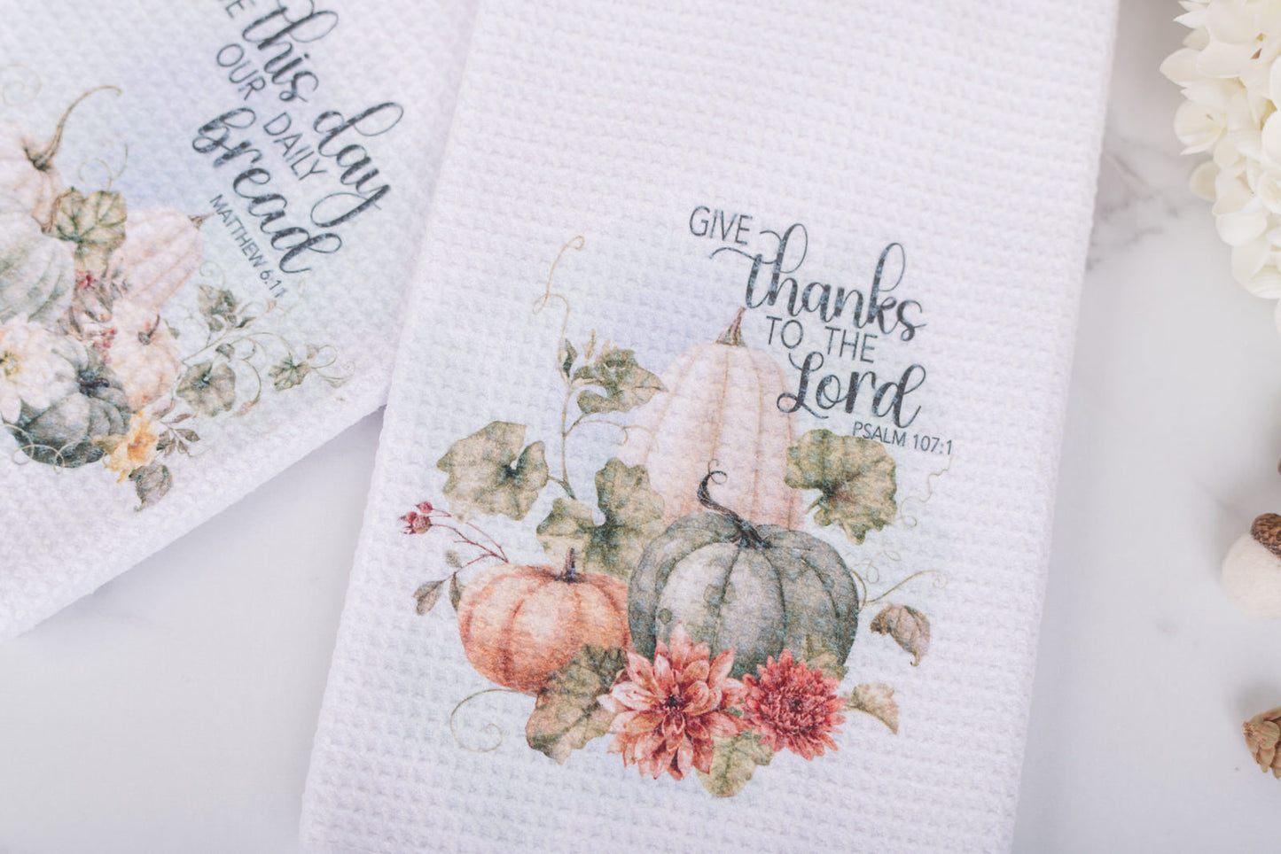 Thanksgiving tea towel with “Give thanks to the Lord” text