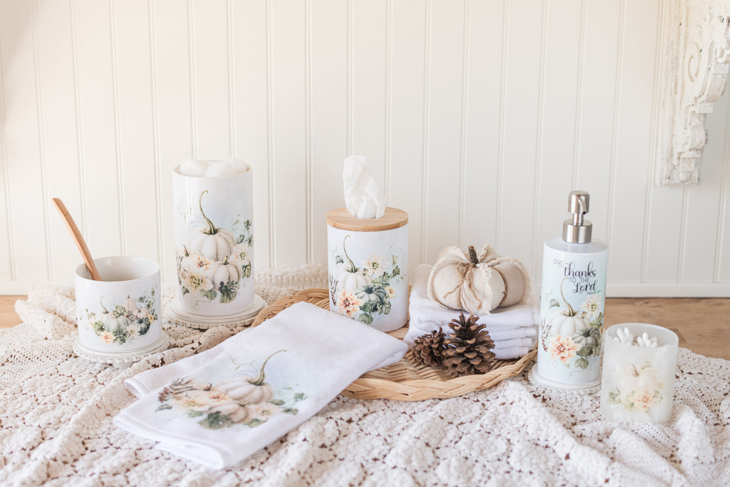 Fall bathroom collection featuring ceramic tissue holder, styled with coordinating canisters, soap, dispenser, and hand towel