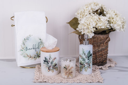Stainless steel fall soap dispenser with oak leaf and acorn design with matching bathroom accessories