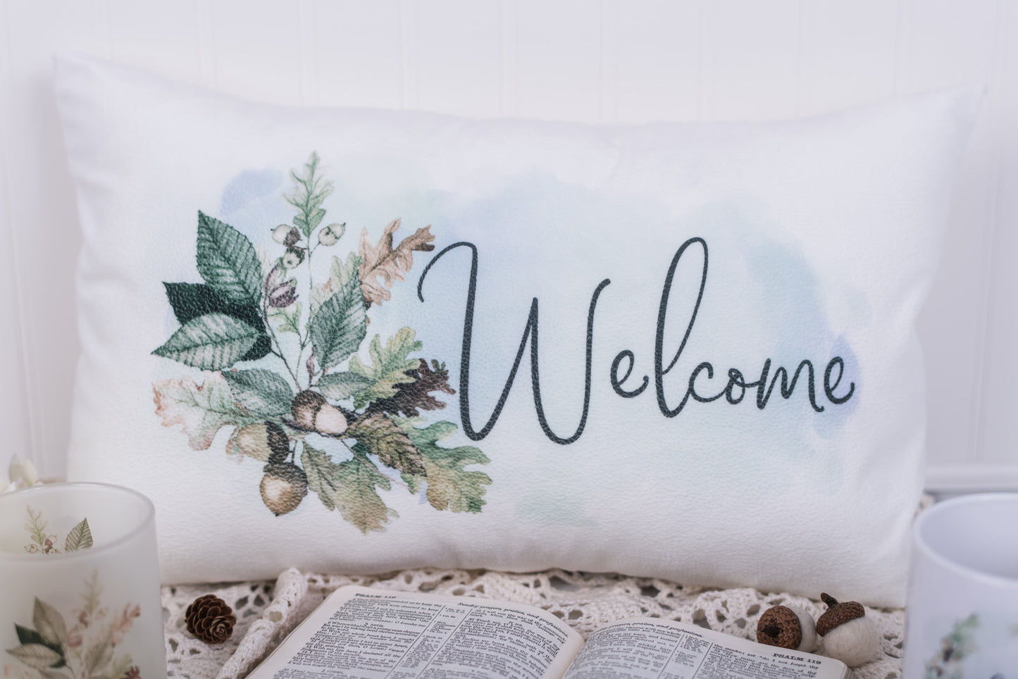 Welcome lumbar pillow cover with watercolor oak leaves and acorns on soft white velveteen – styled for fall entryway or guest room