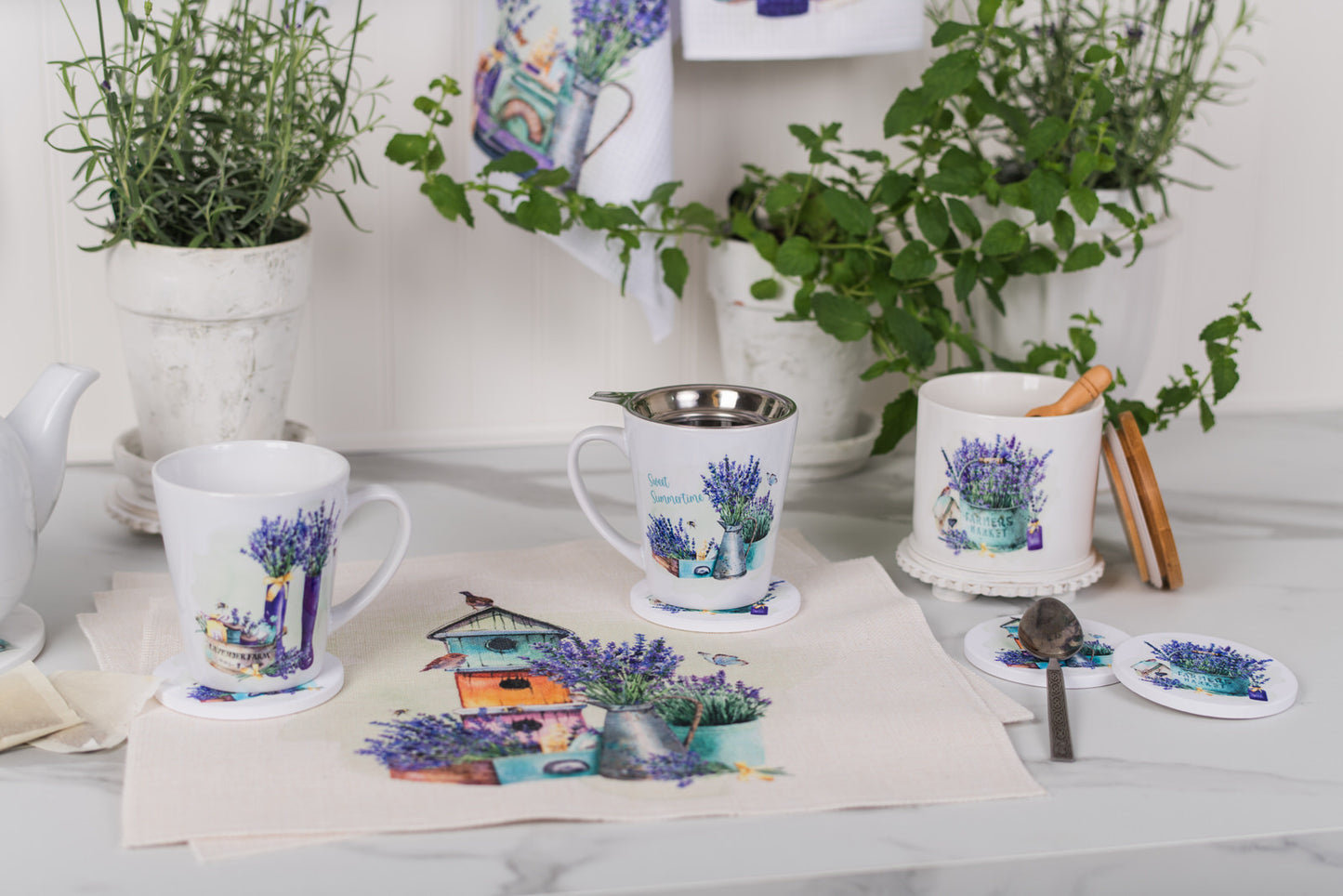 Mugs with floral designs on a table with plants in the background