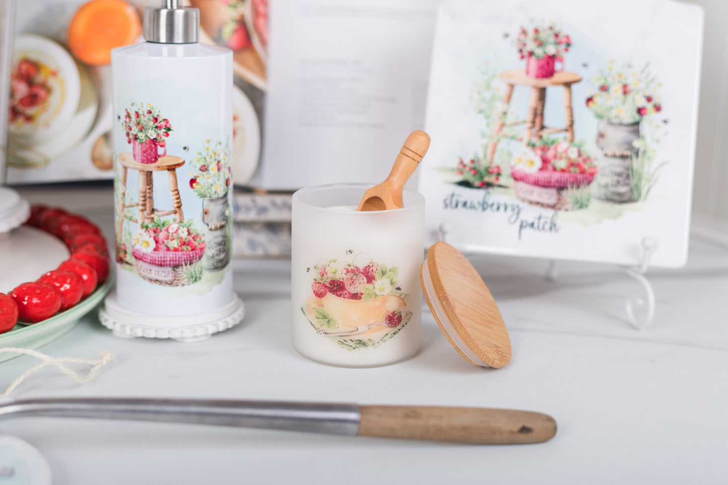 Decorative candle holder with wooden spoon and matching bottle on a white surface