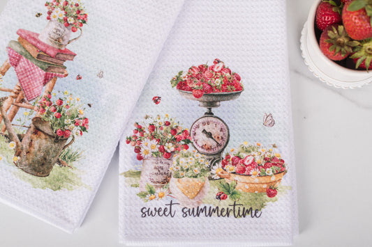 Watercolour strawberry tea towel in a cottage-style summer kitchen.