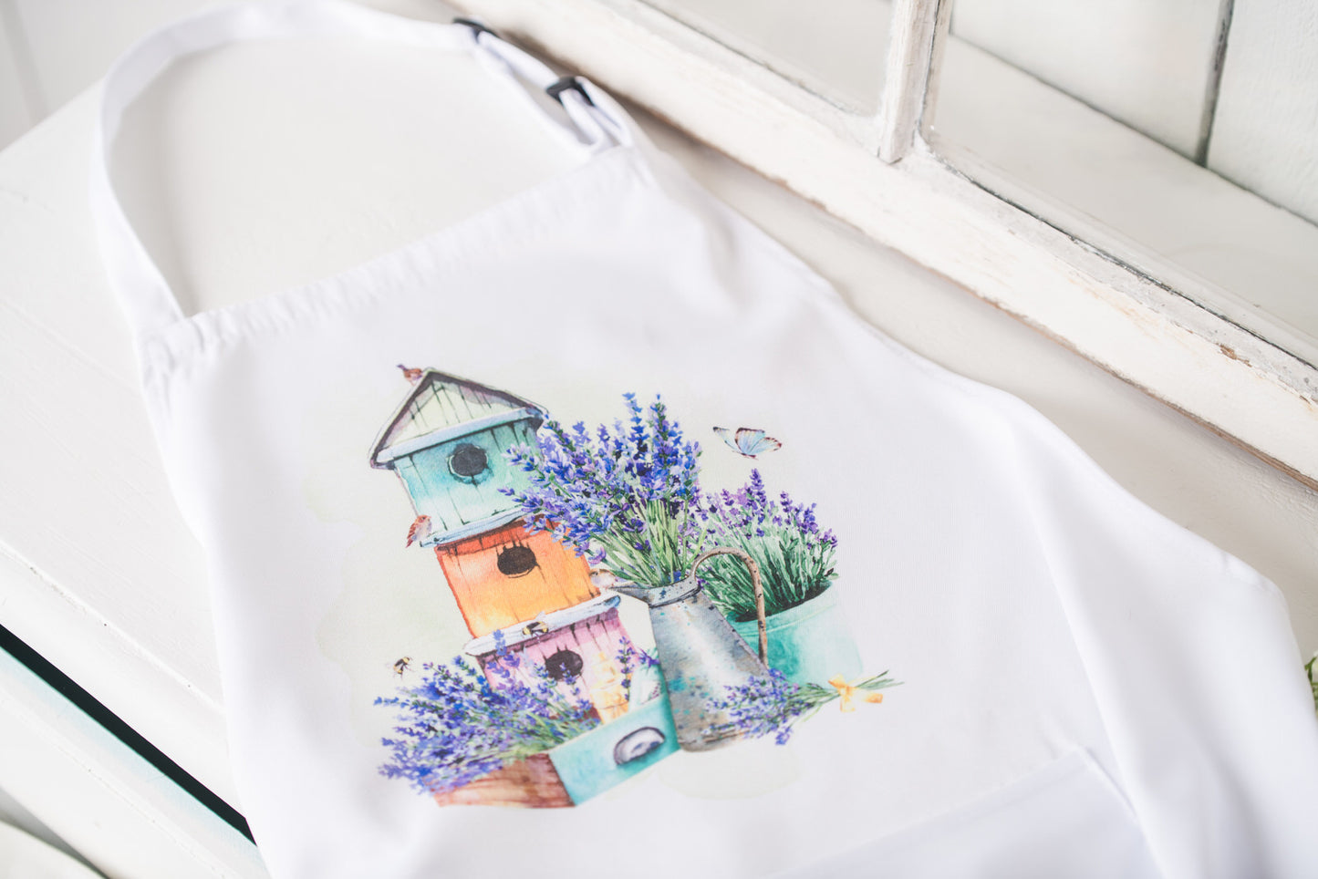 Flat-lay of adult apron with white background