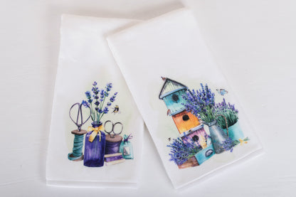 Lavender print towel folded on bathroom counter 