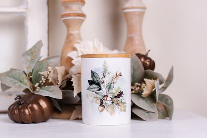 Ceramic fall jar with acorn design and sealed lid holding bath salts