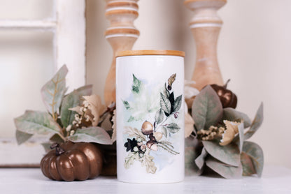 Large Woodland bathroom jar holding bathroom essential on a vanity styled with fall decor