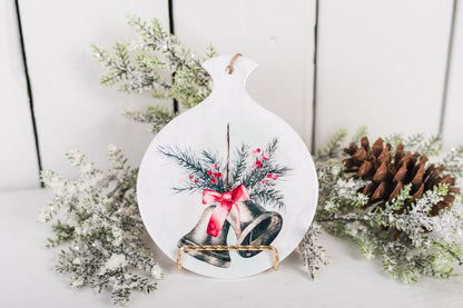 Classic Christmas spoon rest with silver bells and red ribbon