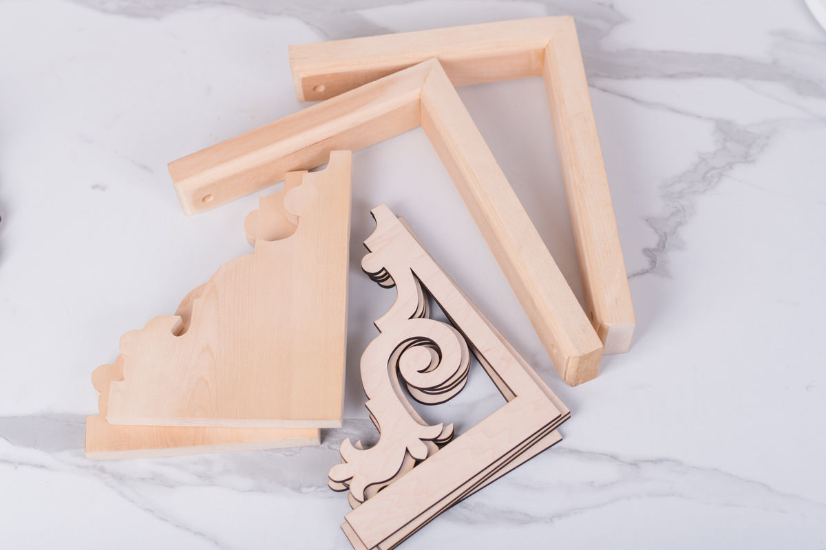 Wooden decorative corner brackets DIY Kit on a marble surface