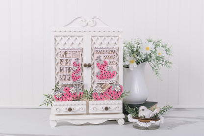 Strawberry patch cottage cabinet inserts DIY wood kit displayed on cottage cabinet
