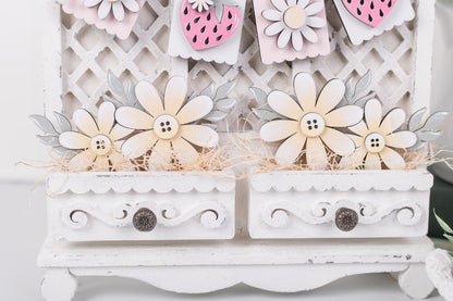 Cottage banner cabinet with mixed strawberry and floral inserts