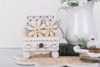 Interchangeable cottage drawer base for shelf styling with daisies