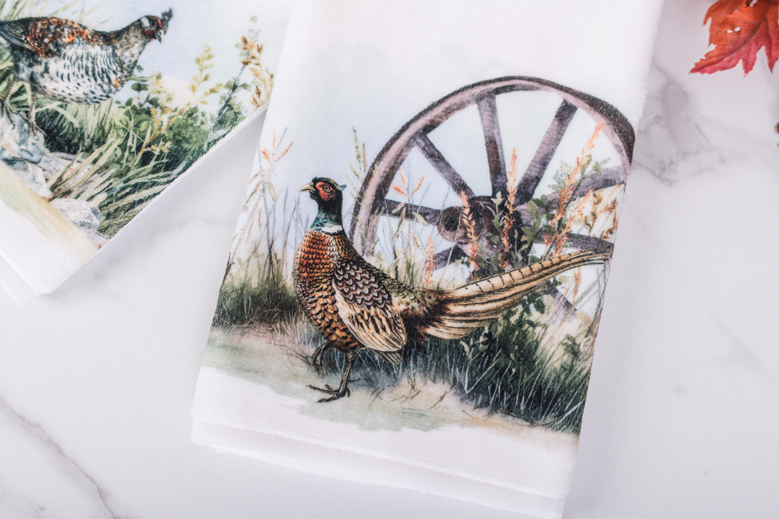 Heritage Collection hand towel with pheasant watercolor design in farmhouse bathroom