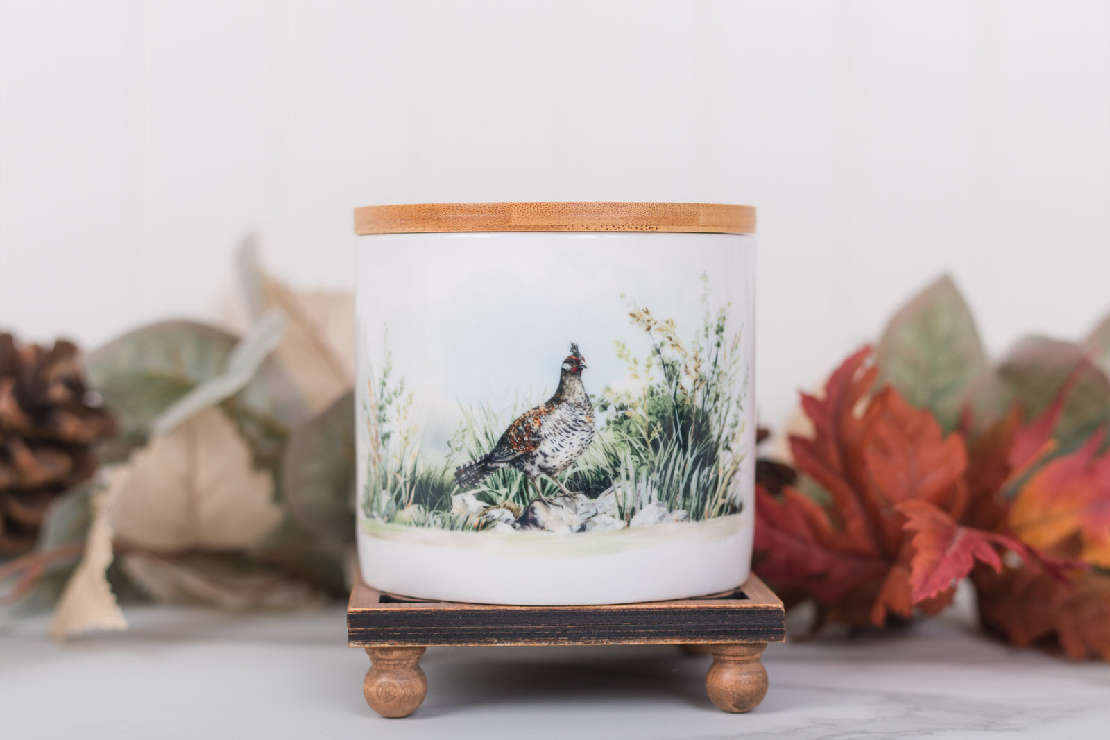  Farmhouse bathroom counter styled with a small Heritage canister