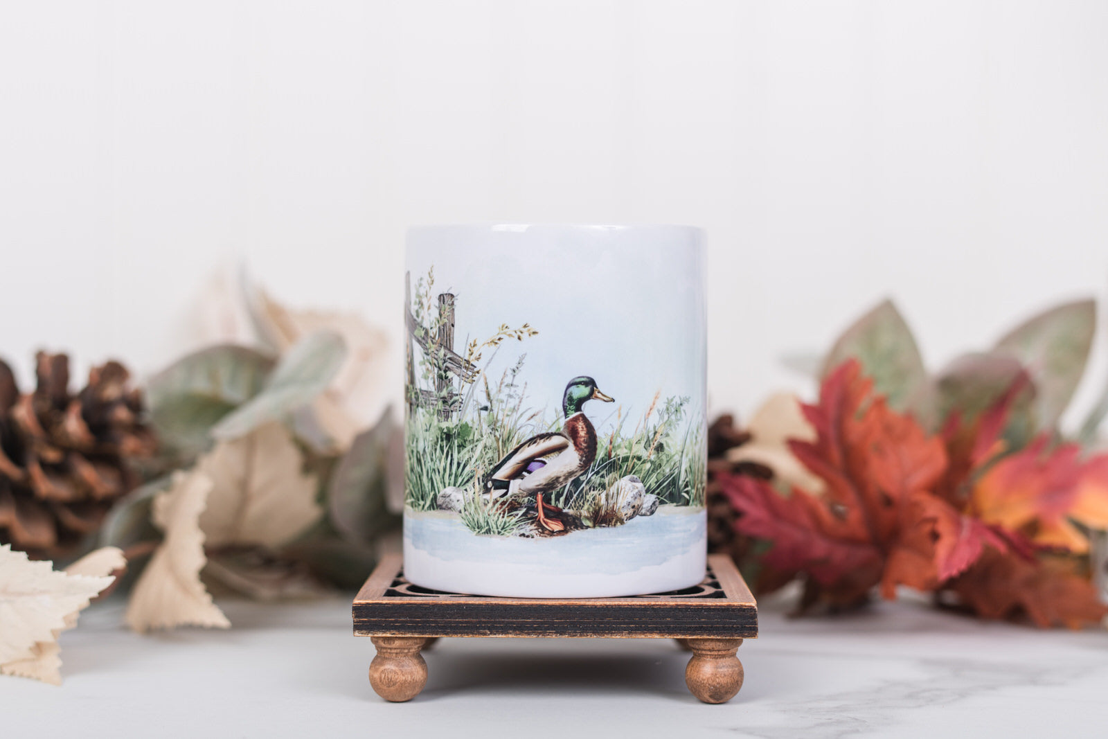 Rustic farmhouse coffee cup featuring a mallard duck design