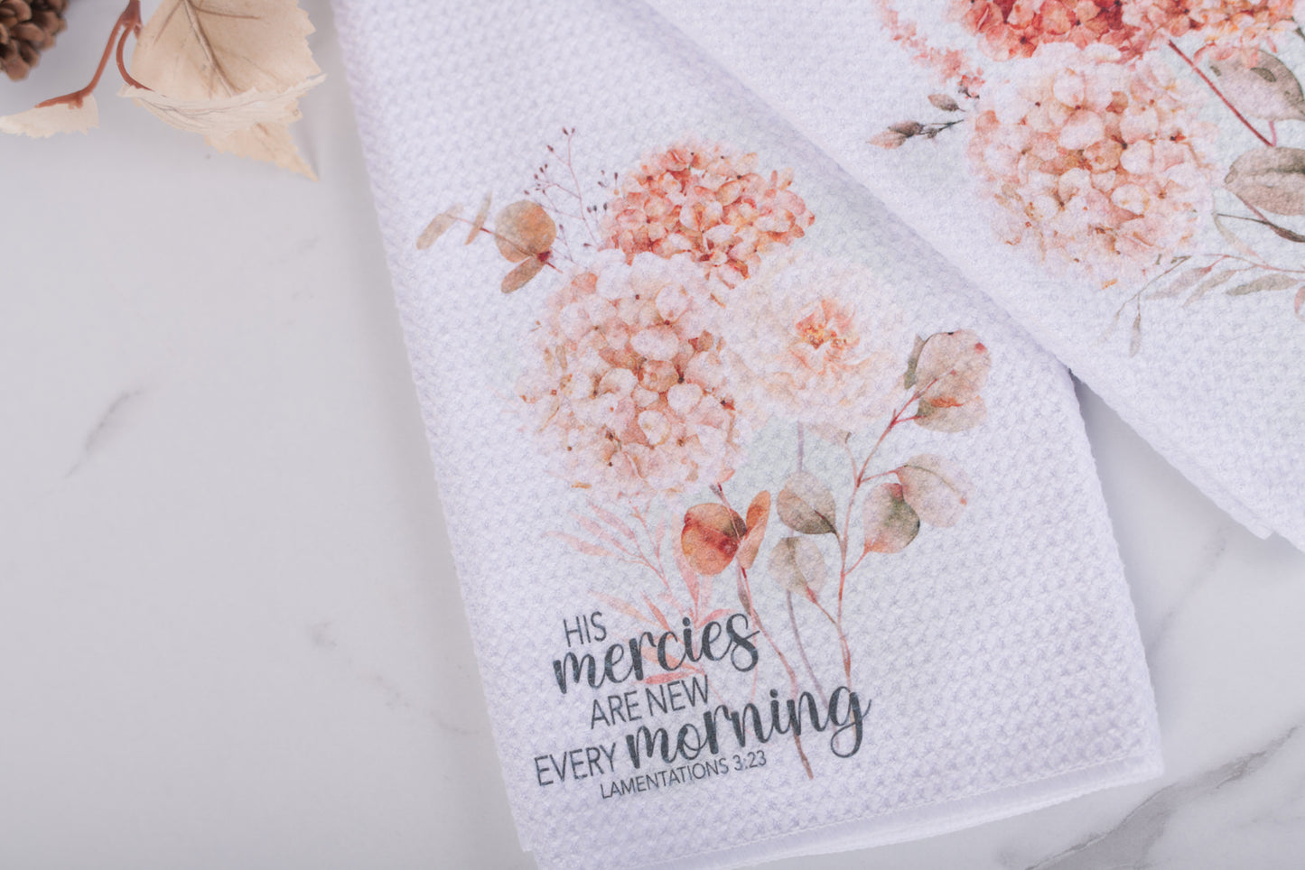 Fall Floral towel with 'His mercies are new every morning' text on a white background