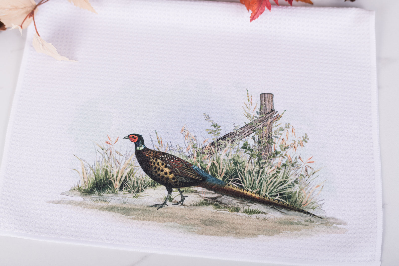 Heritage Collection tea towel with pheasant and rustic fence
