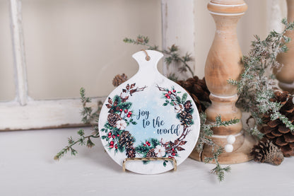 Cozy kitchen Christmas spoon rest with red, green, and brown tones