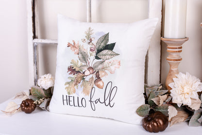 Hello Fall 18x18 white velveteen pillow cover with oak leaves and acorns in watercolor design – autumn decor styled with candles and florals