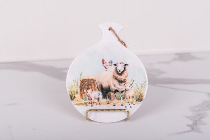 Homestead Collection round trivet with sheep pig lamb and rooster