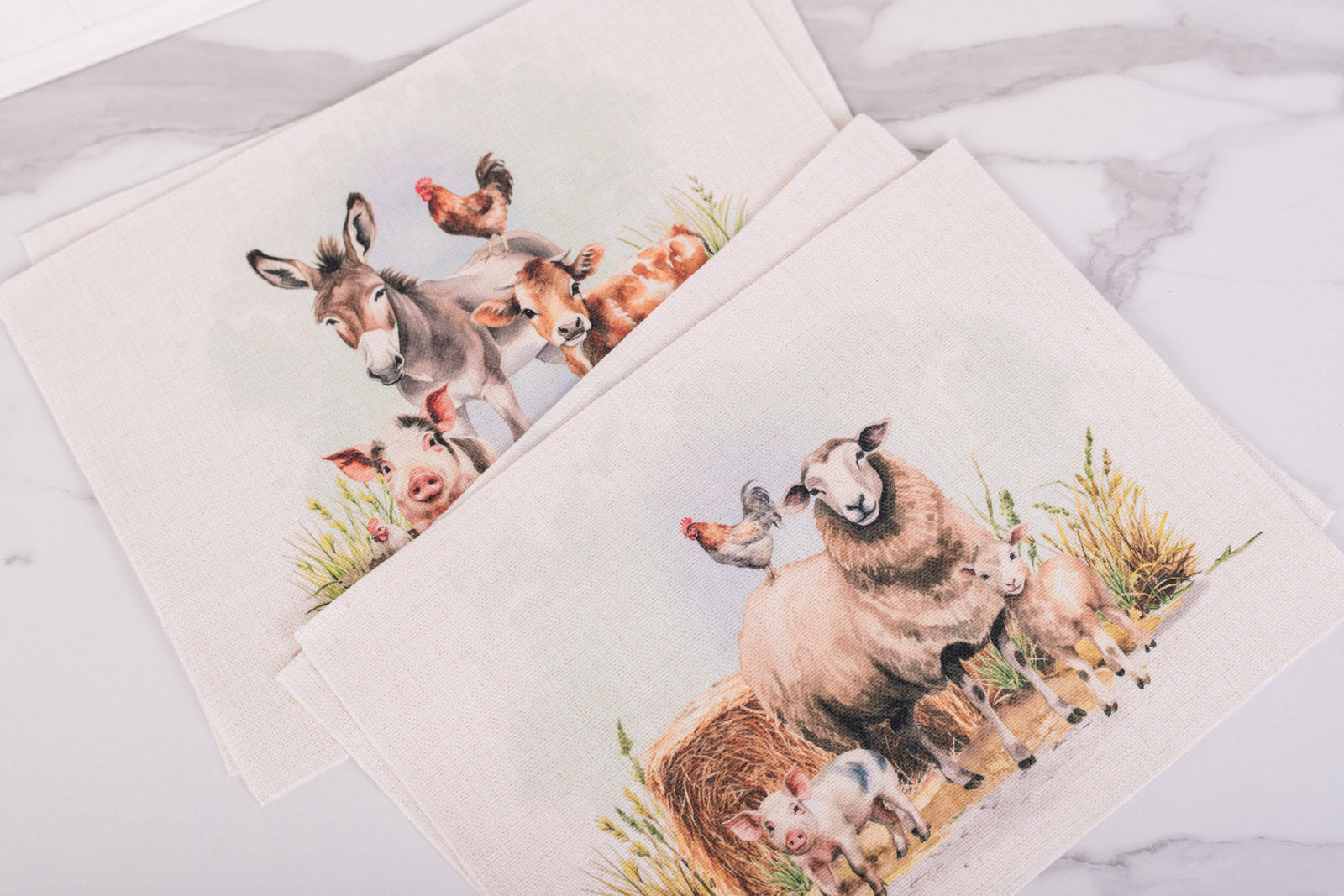 Homestead Collection placemats set of four with watercolor farm animal scenes on neutral fabric