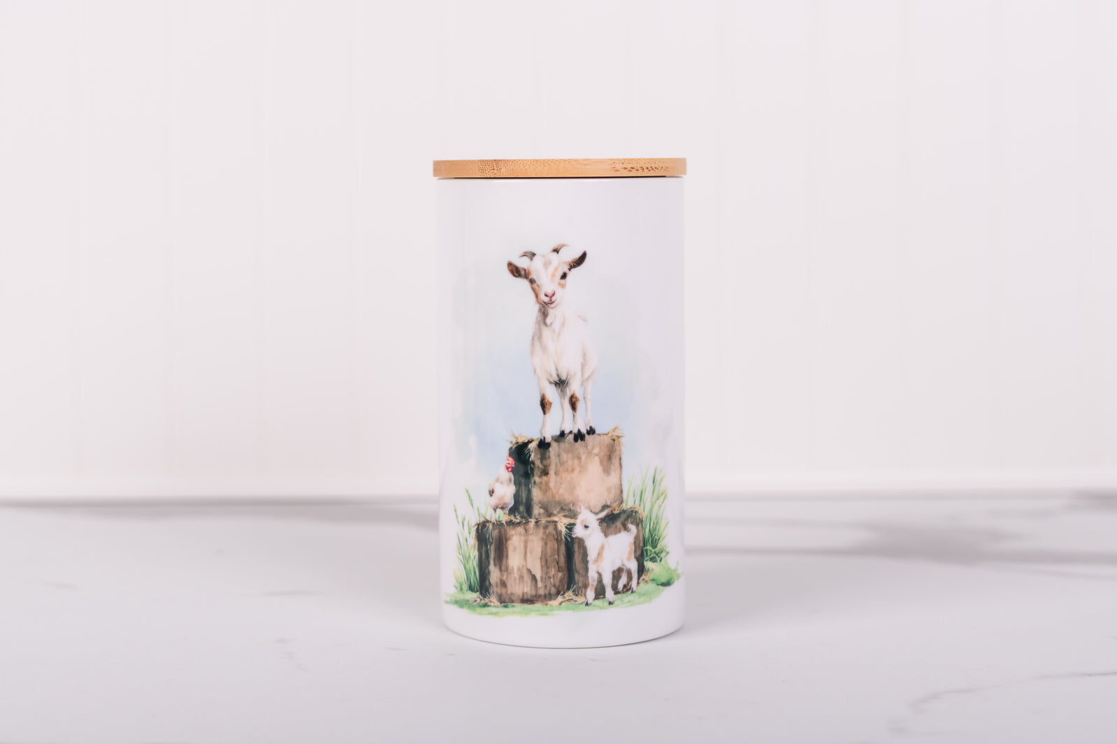 Homestead Collection large ceramic bathroom canister with gotas and a chicken