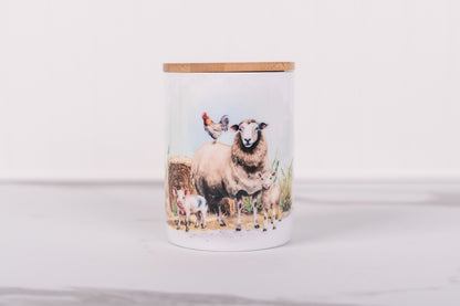 Homestead Collection medium ceramic bathroom canister with sheep and farm animals