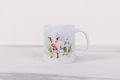 White mug with a pig illustration on a white background