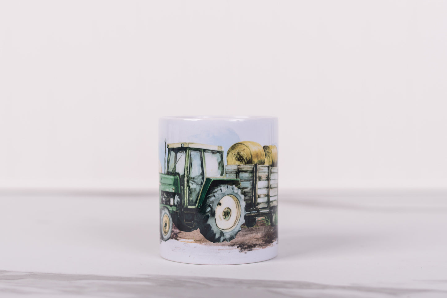 Mug with a tractor design on a white background