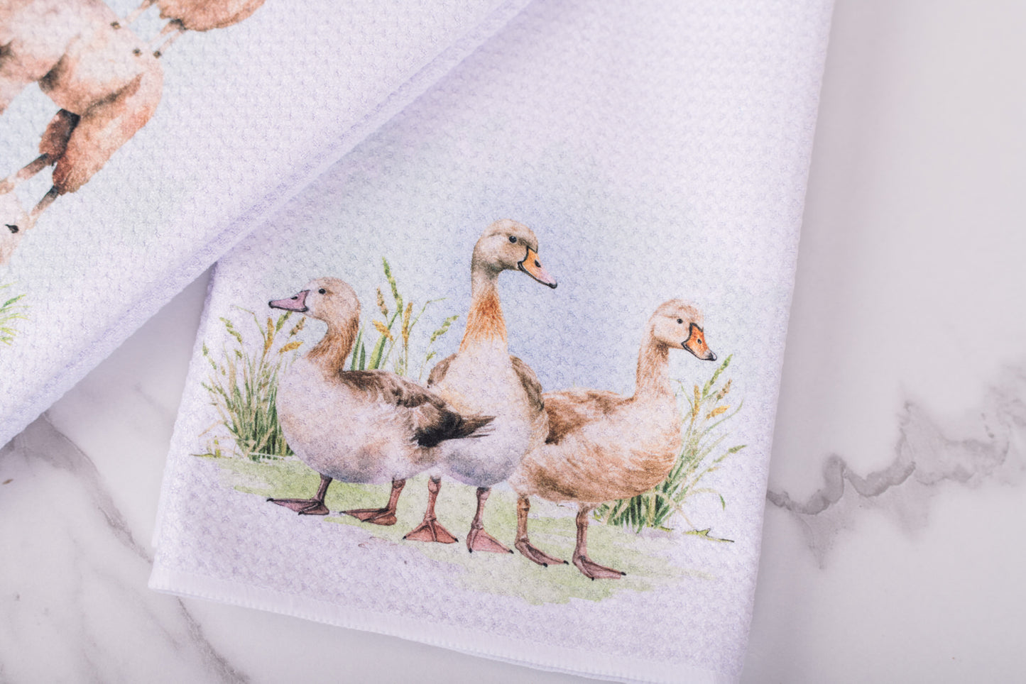 Homestead tea towel with walking ducks design