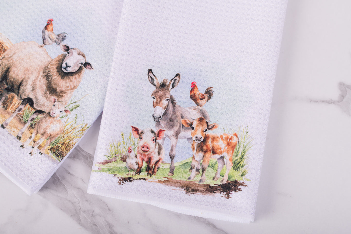 Homestead tea towel with donkey, pig, and calf design